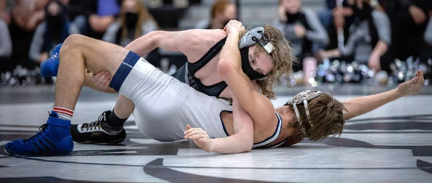 ATHENS PINS DOWN WINS OVER NP-LIBERTY, WILLIAMSON