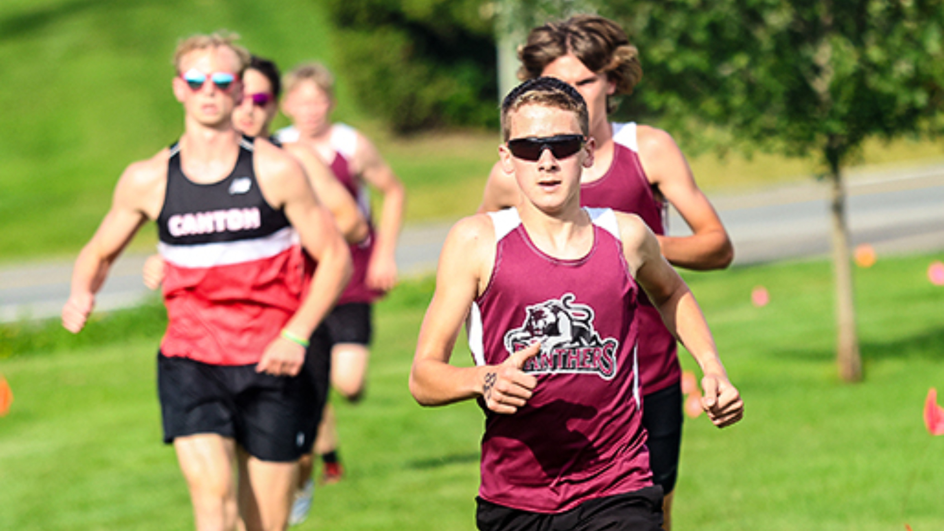 NEB Boys, Girls Top Canton
