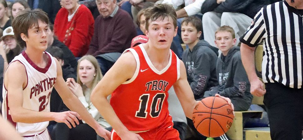 Trojans Roll Past NEB In Season Opener