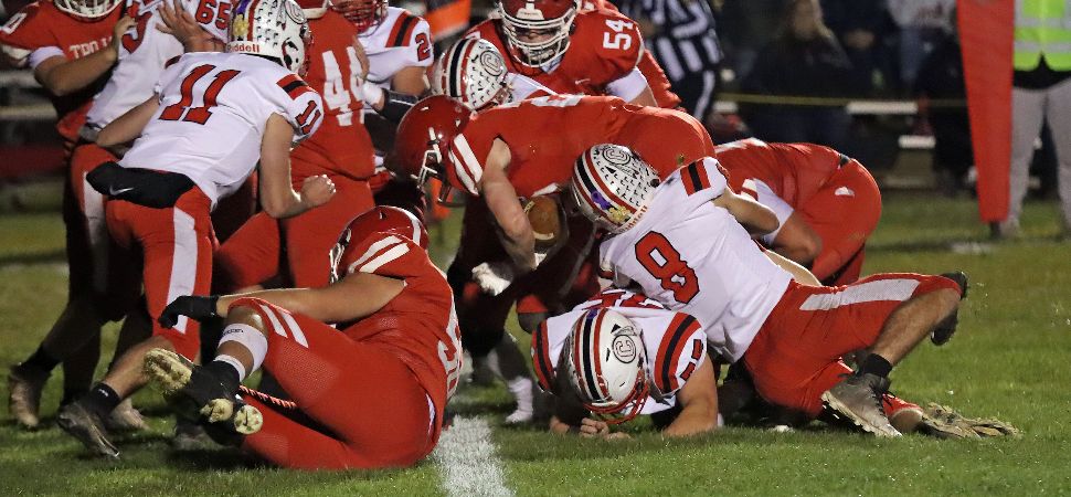 Trojans Roll Past Rival Canton For Old Shoe Win