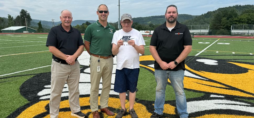 Crumb Receives District IV 'Super Fan' Pass.