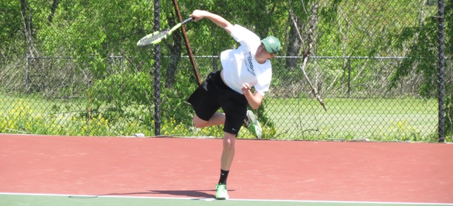 Redell competes in District tennis singles