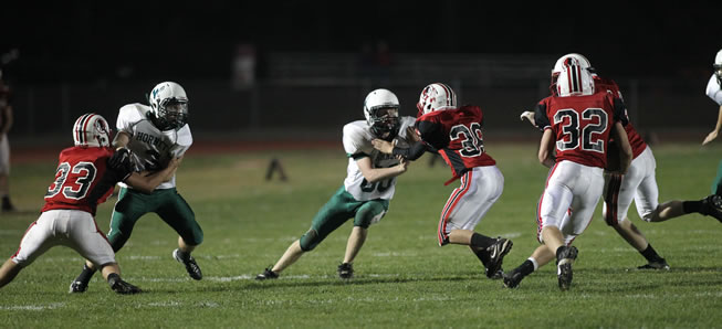 J.V. football tops Canton, 29-22.