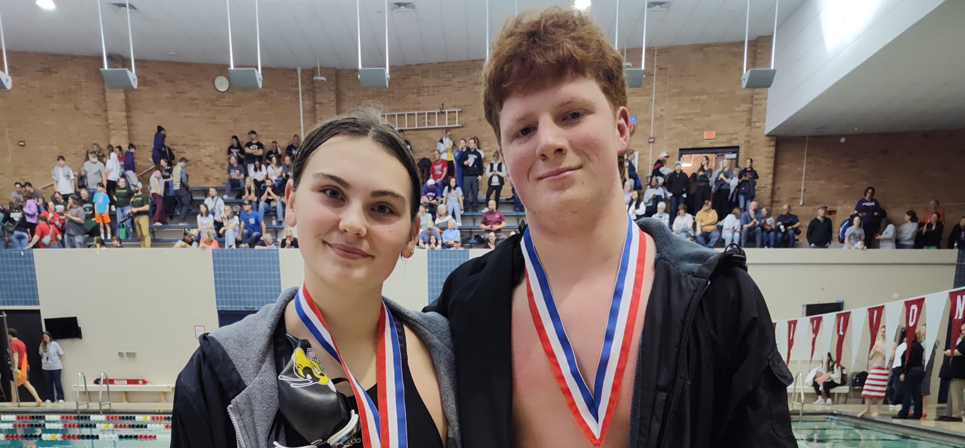 Anderegg, Robbins Medal On First Day Of District Swimming Championships