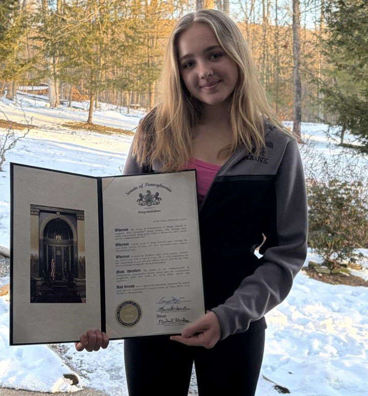 Lauren Kosek holding PA State Senate Citation