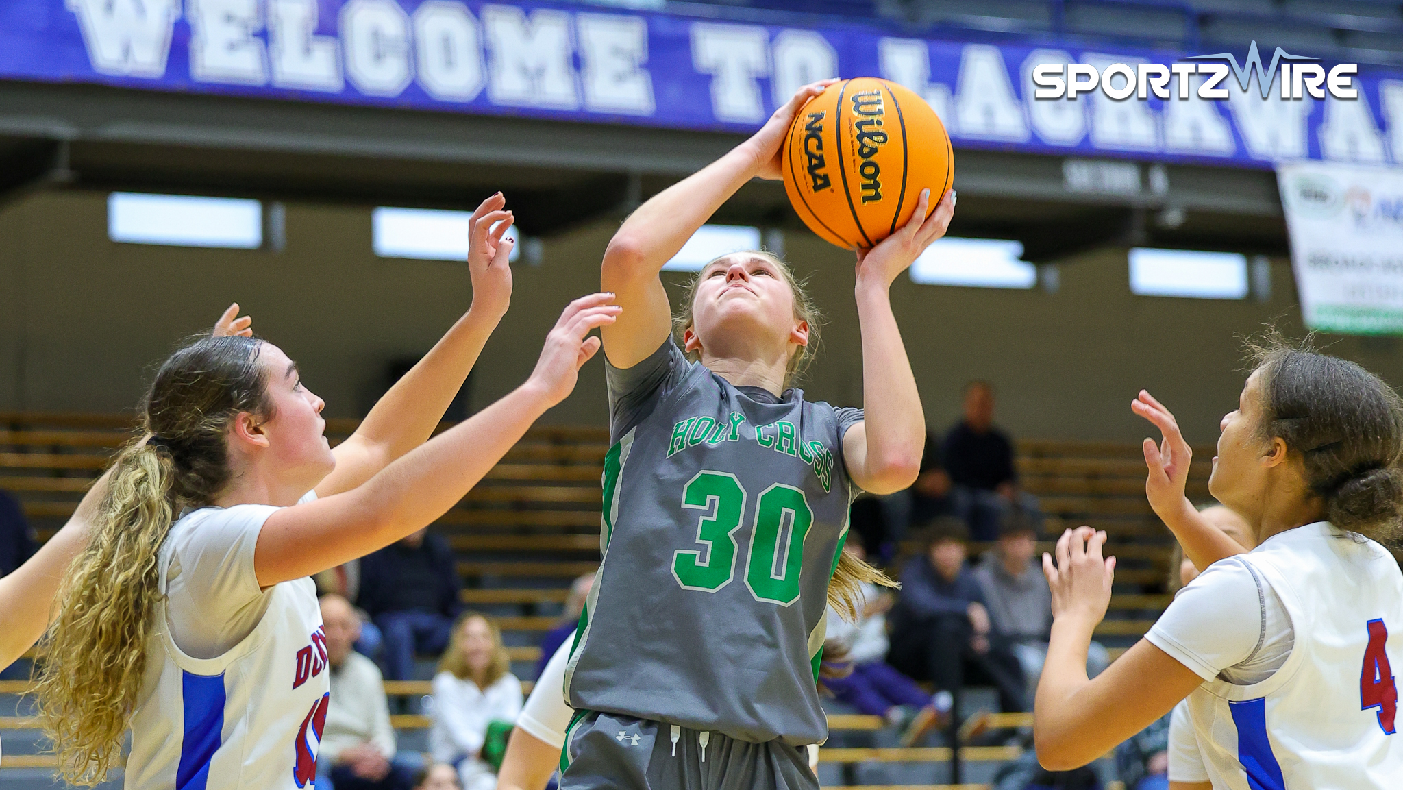 Balanced Lady Bucks Pull Away Late to Open Lynett Memorial with Win Over Holy Cross